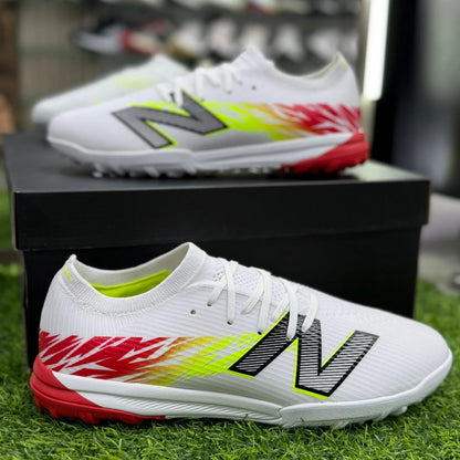 NEWBALANCE TAKELA CHAUSSURE DE FOOTBALL TF
