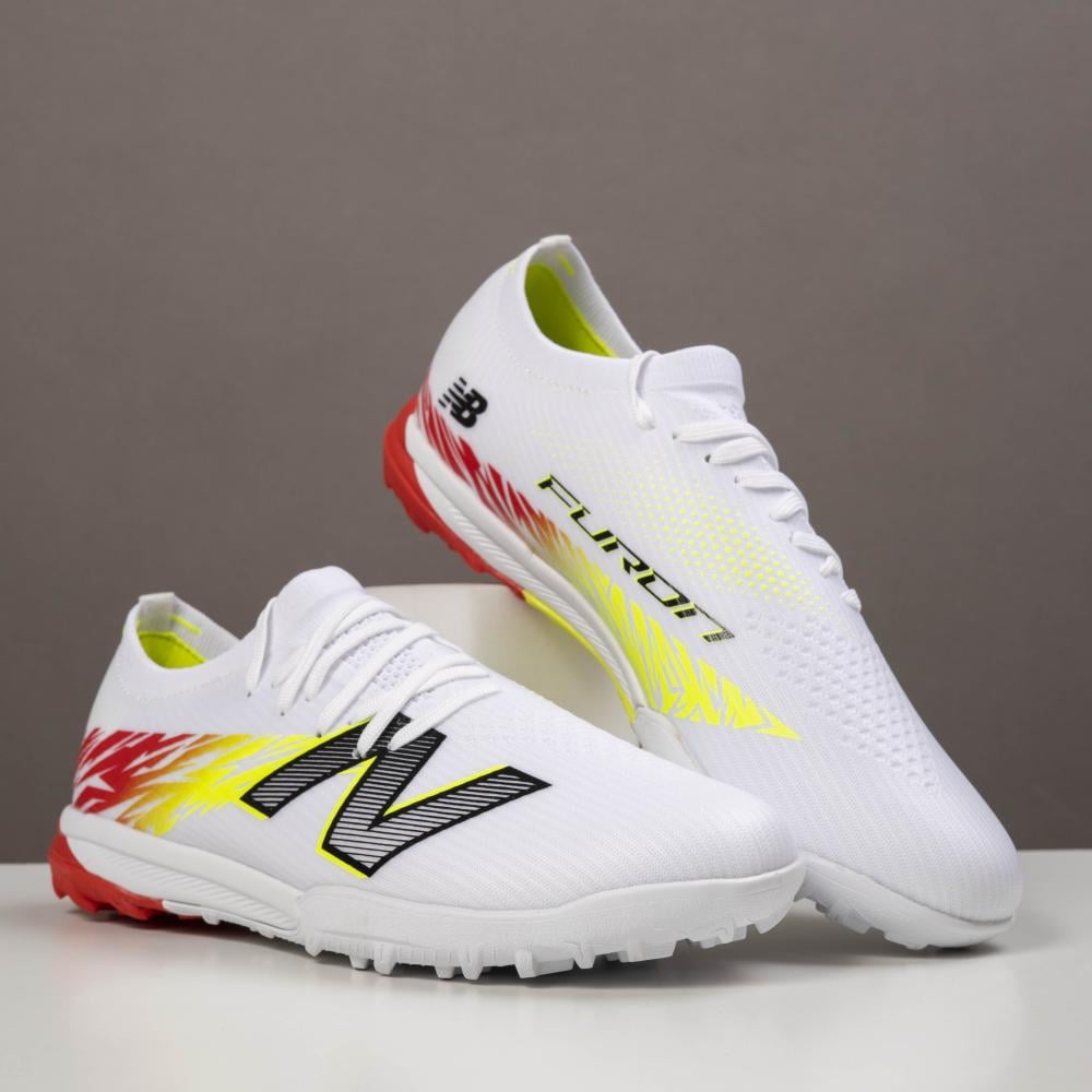 NEWBALANCE TAKELA CHAUSSURE DE FOOTBALL TF