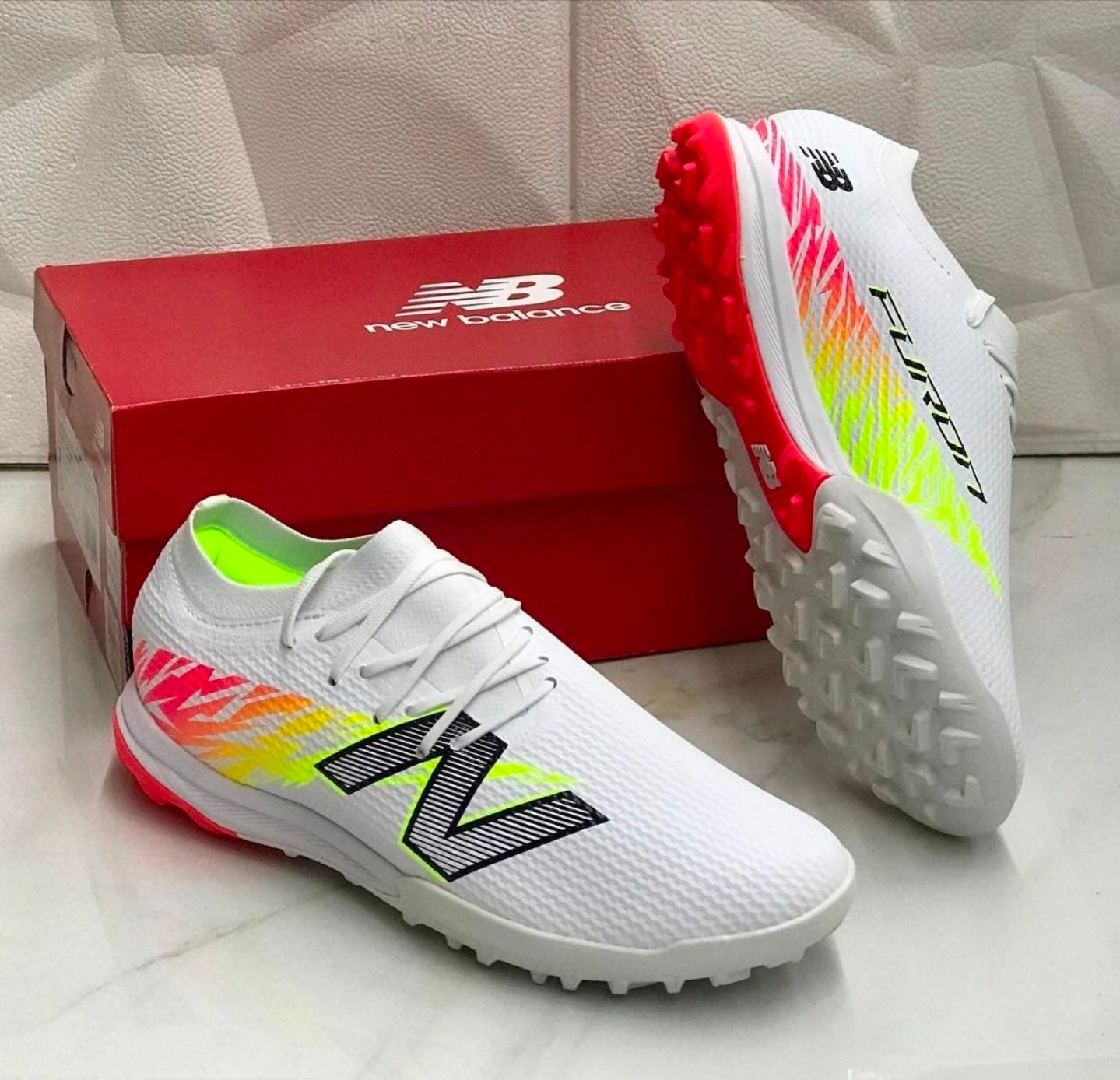 NEWBALANCE TAKELA CHAUSSURE DE FOOTBALL TF