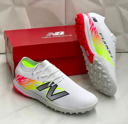 NEWBALANCE TAKELA CHAUSSURE DE FOOTBALL TF