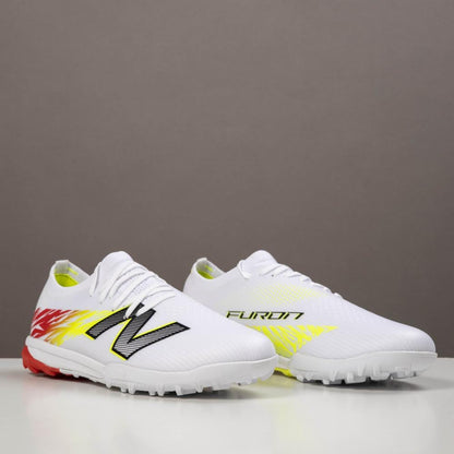 NEWBALANCE TAKELA CHAUSSURE DE FOOTBALL TF